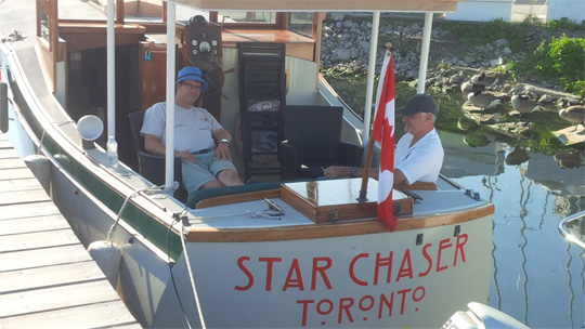 The winning crew going over the SI�s before racing.