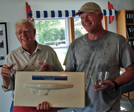 1st Place Overall  Gene McCarthy (left) and Glenn McCarthy (right) with the brand new perpetual trophy graciously donated this year by Race Technician Blan Page. What devious plan is Glenn thinking up now?