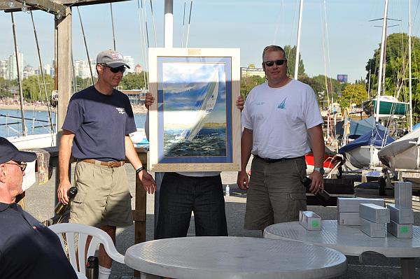 Dave Watt and Dave Martin receive District 6 Championship award from Brett (legs) Wilson.